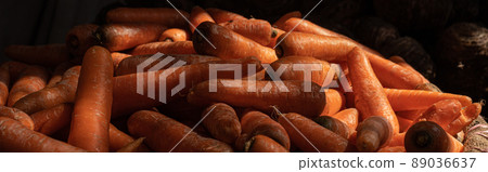 Heap of carrots in local market 89036637