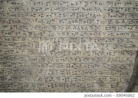 Ancient cuneiform writing script on the wall. High quality photo Ancient cuneiform writing script on the wall. High quality photo 89040862