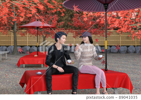 A couple of young men and women who came to Kyoto for sightseeing are drinking tea while eating sakura mochi and sitting under a Nodate umbrella outside and having a fun conversation. A couple of young men and women who came to Kyoto for sightseeing are drinking tea while eating sakura mochi and sitting under a Nodate umbrella outside and having a fun conversation. 89041035