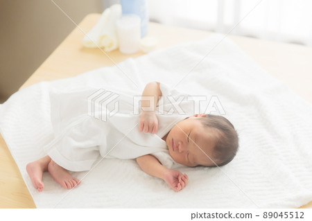 Preparation for a newborn baby in sleeping underwear Preparation for a newborn baby in sleeping underwear 89045512