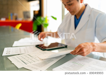 Men in lab coats and tablets Men in lab coats and tablets 89049993