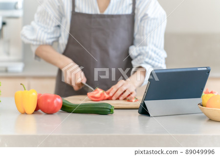 Kitchen cooking vegetables cutting women's hands 89049996