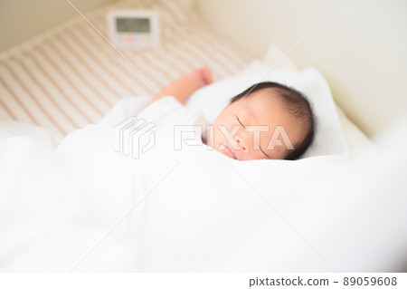 12-day-old newborn baby sleeping face temperature control 89059608