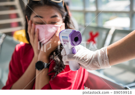 girl with mask shock of high temperature result in airport girl with mask shock of high temperature result in airport 89059918