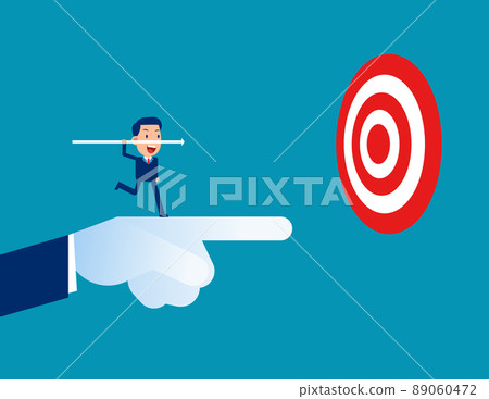 Leader pointing to target with colleague throwing the arrow as symbol of finding success 89060472