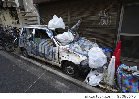 Illegal dumped scrapped cars, illegally dumped scrapped cars, stolen cars illegally parked in garbage dumps, decayed fruits Illegal dumped scrapped cars, illegally dumped scrapped cars, stolen cars illegally parked in garbage dumps, decayed fruits 89060579