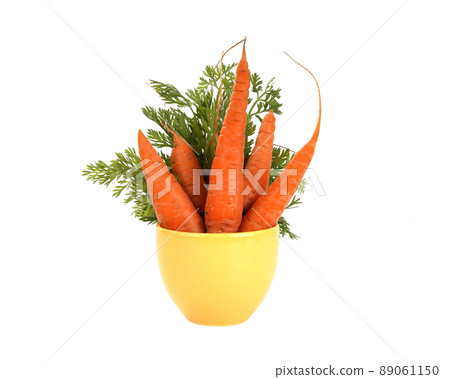 Fresh carrots on white background Fresh carrots on white background 89061150