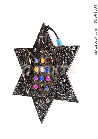 Metal silver star of David with colorful stones on white background. Metal silver star of David with colorful stones on white background. 89061934