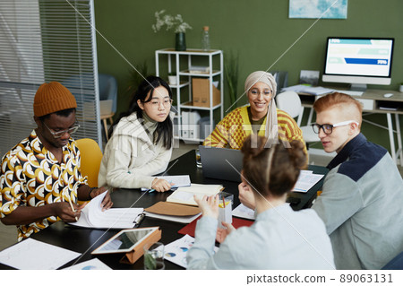 Diverse Young Team in Meeting 89063131