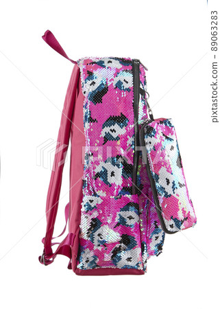 Pink backpack embroidered with colored shiny sequins, with a zipper, with an external patch pocket isolated on a white background. Side view. 89063283