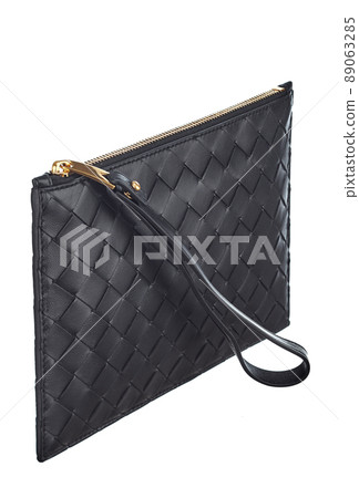 Magnificent rectangular purse-purse made of braided black leather, with a loop for the hand, isolated on a white background. Expensive leather accessories. Magnificent rectangular purse-purse made of braided black leather, with a loop for the hand, isolated on a white background. Expensive leather accessories. 89063285