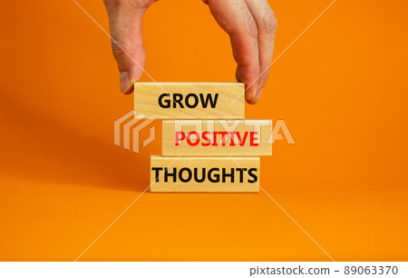 Grow positive thoughts symbol. Concept words Grow positive thoughts on blocks. Businessman hand. Beautiful orange table orange background. Business grow positive thoughts concept. Copy space. Grow positive thoughts symbol. Concept words Grow positive thoughts on blocks. Businessman hand. Beautiful orange table orange background. Business grow positive thoughts concept. Copy space. 89063370