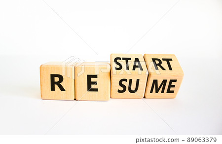 Restart and resume symbol. Turned cubes and changed the word 'restart' to 'resume'. Beautiful white background. Business and restart - resume concept. Copy space. Restart and resume symbol. Turned cubes and changed the word 'restart' to 'resume'. Beautiful white background. Business and restart - resume concept. Copy space. 89063379