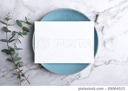 Wedding stationery invitation card mockup 5x7 on marble background with eucalyptus, Menu card mockup with table setting 89064033