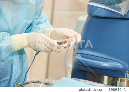 Ophthalmology laser microscope operation. Doctor surgery in clinic 89065041
