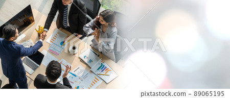 Group business people handshake at meeting table in widen view 89065195