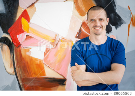 Portrait of a man at home. Attractive male 89065863