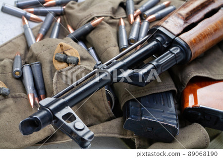 Kalashnikov ak gun and Chicom Chest Rig with 7,62 mm cartridges Kalashnikov ak gun and Chicom Chest Rig with 7,62 mm cartridges 89068190