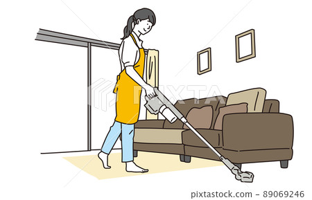 Asian woman vacuuming in the living room 89069246