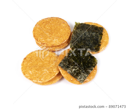 Japanese rice crackers on white background Japanese rice crackers on white background 89071473