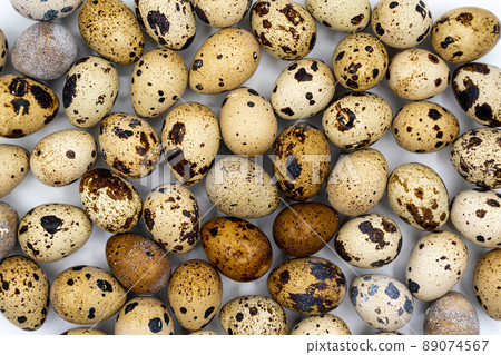 Background from quail eggs. Easter background. Easter quail eggs. Background from quail eggs. Easter background. Easter quail eggs. 89074567