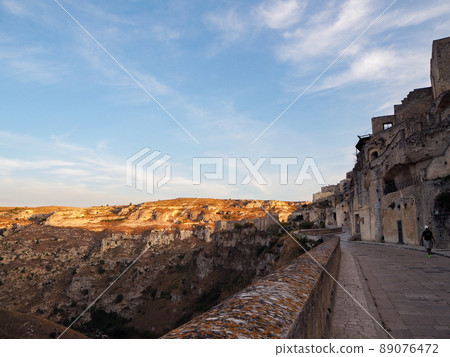 The city of Matera standing on a precipitous cliff The city of Matera standing on a precipitous cliff 89076472