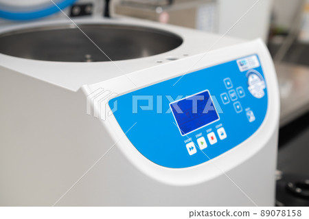 Opened centrifuge for sample preparation and phase separation in analytical or clinical laboratory. Opened centrifuge for sample preparation and phase separation in analytical or clinical laboratory. 89078158