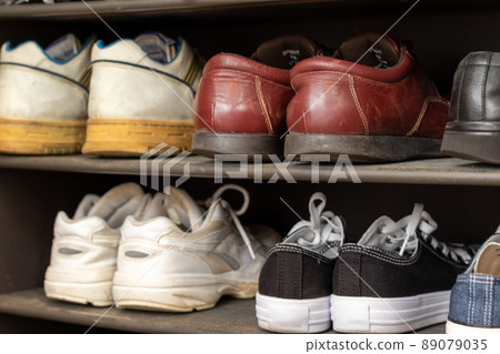 Shoes stored in a shoe box 89079035