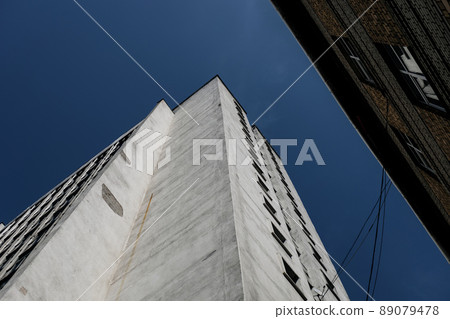 Old concrete building Old concrete building 89079478