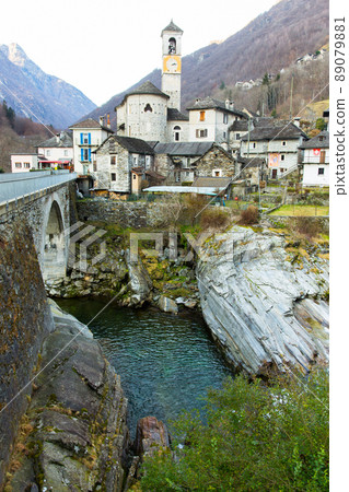 River, bridge, buildings in the town of Lavertezzo. Switzerland. Alps River, bridge, buildings in the town of Lavertezzo. Switzerland. Alps 89079881