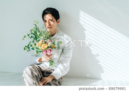 A man with a bouquet A man with a bouquet 89079991