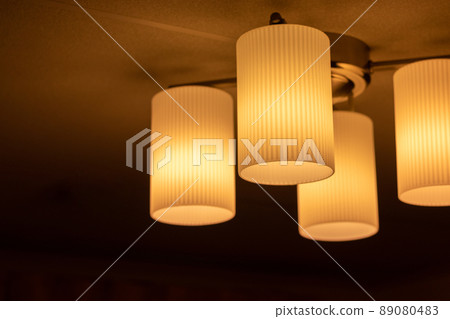 Orange lighting that illuminates the inside of the room Orange lighting that illuminates the inside of the room 89080483