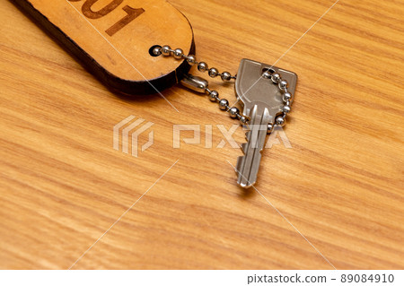 Room key placed on the desk 89084910