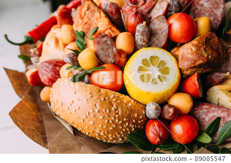 Delicious edible bouquet of sausage, tomatoes, cheese. Gift for man. Delicious edible bouquet of sausage, tomatoes, cheese. Gift for man. 89085547
