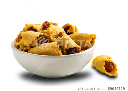 Side view of Pineapple Pie in white ceramic bowl isolated on white background. 89086119