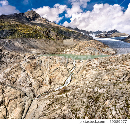 The Rhone Glacier, the source of the Rhone River at Furka Pass in the Swiss Alps The Rhone Glacier, the source of the Rhone River at Furka Pass in the Swiss Alps 89089977