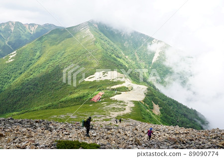 Climbers on the mountain trail towards the Jonen Pass and the Jonen Hut 89090774
