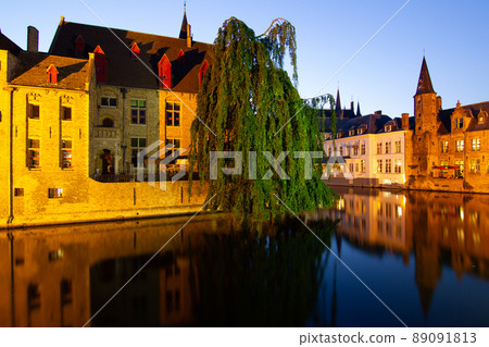 Bruges, Belgium night scene on the Rozenhoedkaai River 89091813