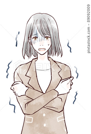 一個女人抱著她的胳膊顫抖著 一個女人抱著她的胳膊顫抖著 89092009