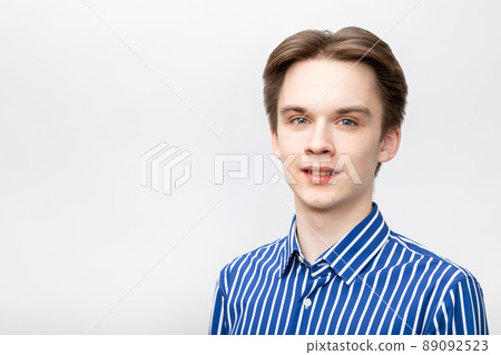 Cheerful young man studio portrait Cheerful young man studio portrait 89092523