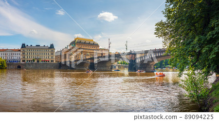 National Theatre building and Legion Bridge, Prague, Czech republic, waterfront view across the river Vltava 89094225