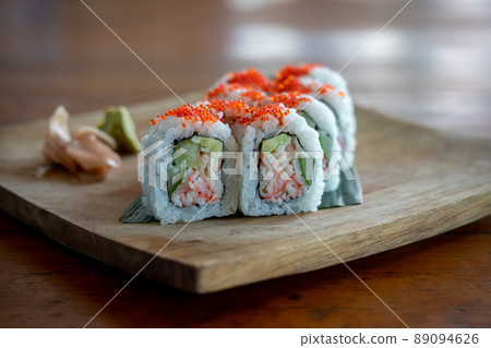 Maki Sushi on a Wooden Plate 89094626