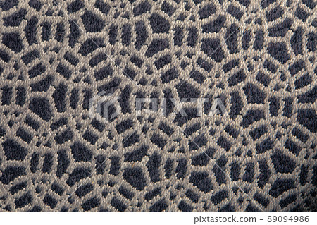 Abstract circular print background on cotton fabric in gray biege tone Abstract circular print background on cotton fabric in gray biege tone 89094986