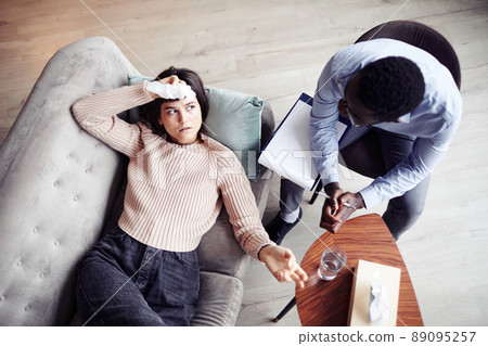 Emotional Woman in Psychotherapy Session 89095257