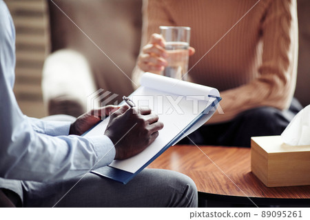 Psychiatrist Taking Notes Psychiatrist Taking Notes 89095261