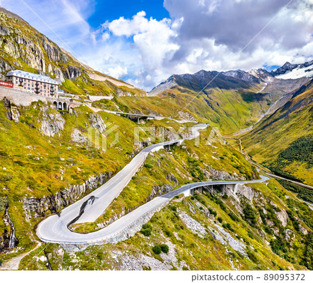 Zig-zag road to Furka Pass in the Swiss Alps 89095372