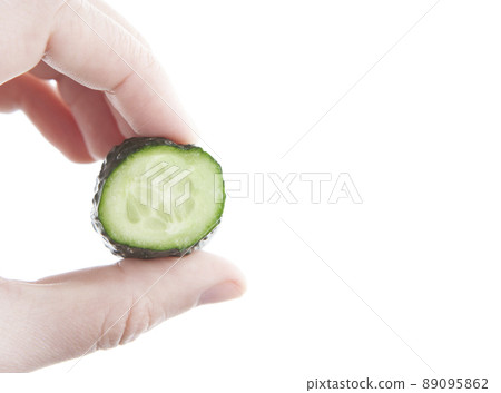 image of cucumber hand white background 89095862