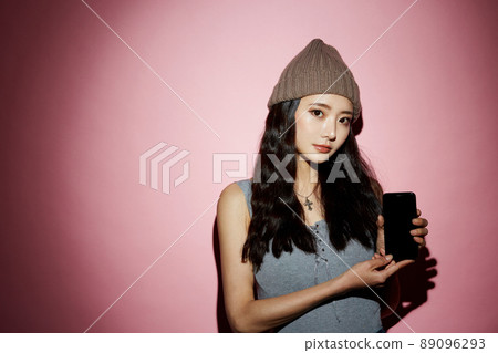 Cool portrait of a young woman in street fashion Cool portrait of a young woman in street fashion 89096293