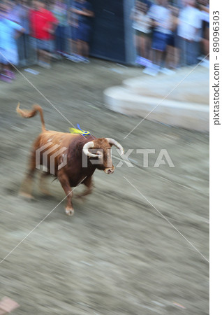 Brave bull going out to the town square Brave bull going out to the town square 89096303