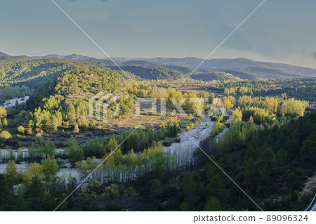 Narrow river between the green mountains Narrow river between the green mountains 89096324